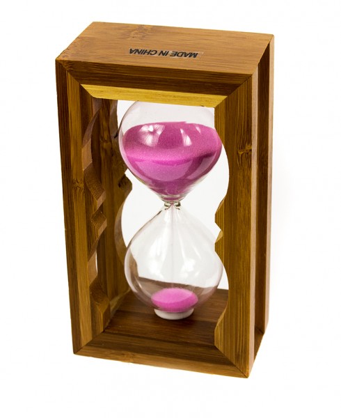 Годинник пісочний в бамбуку рожевий пісок . Годинник пісочний в бамбуку рожевий пісок .